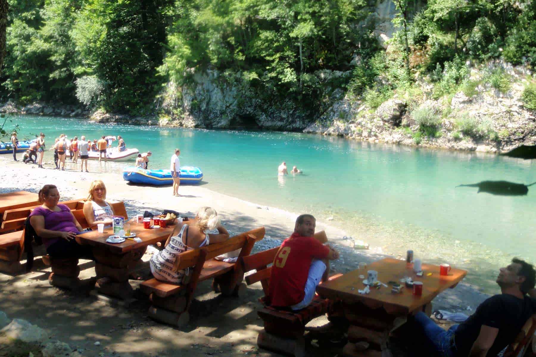 Emjoying a meal and drinks after rafting adventure
