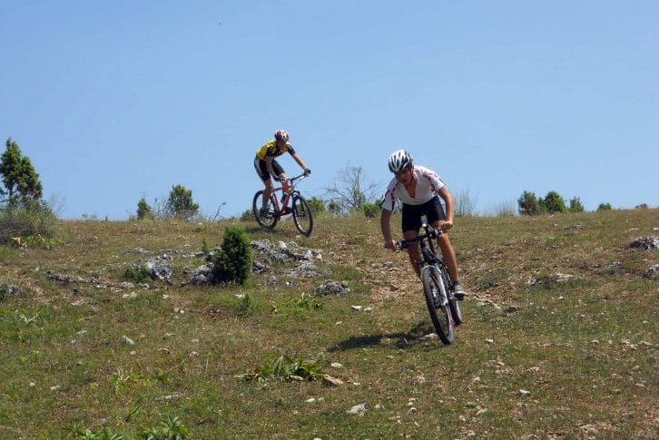 Two biking Kosanica across the mountain range