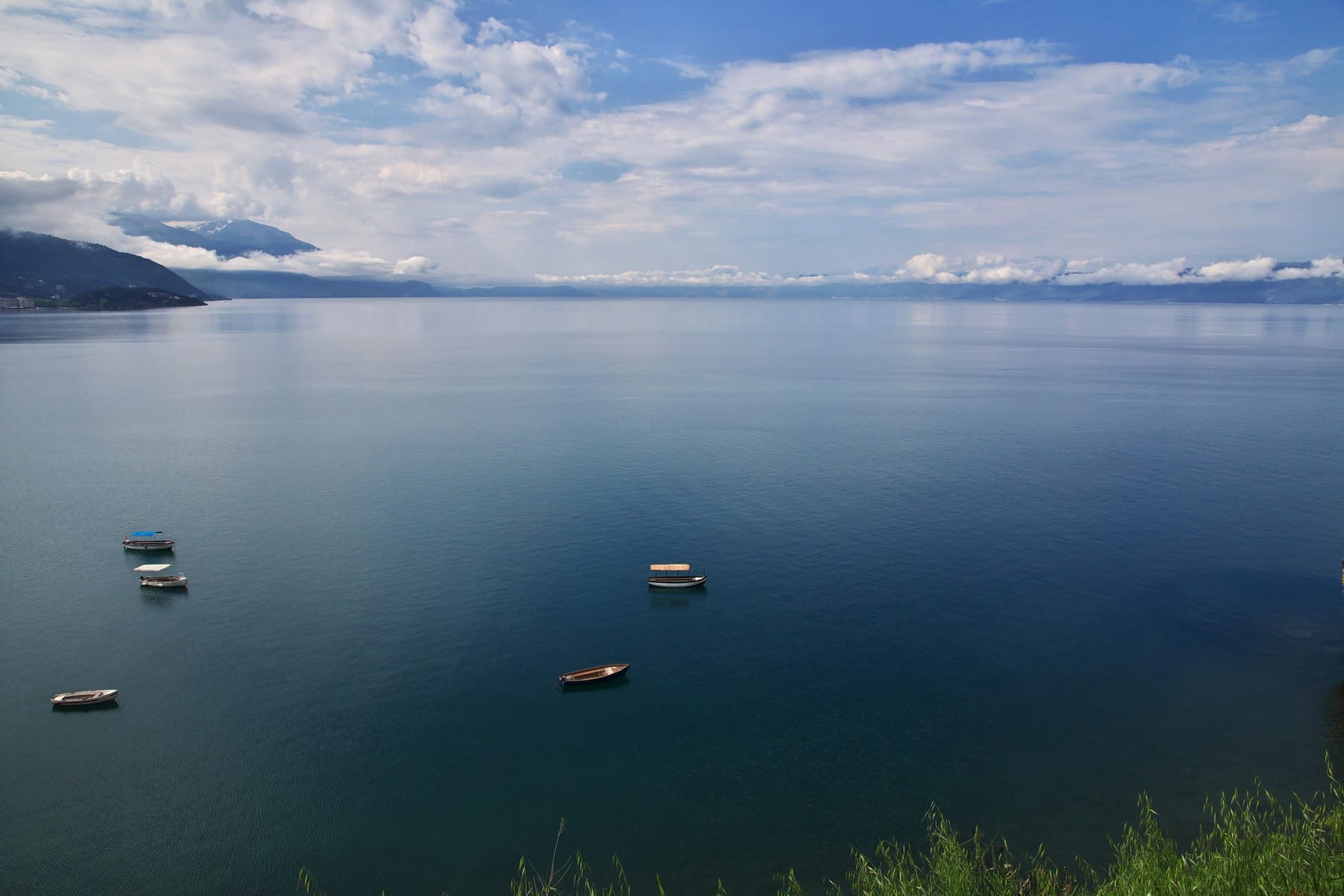Boats on majestic Ohrid Lake Ohrid Macedonia