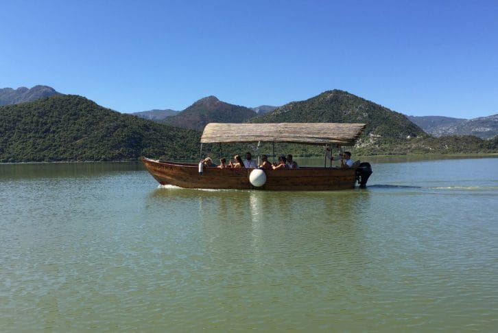 Boat with tourists on the Skadar Lake, Montenegro