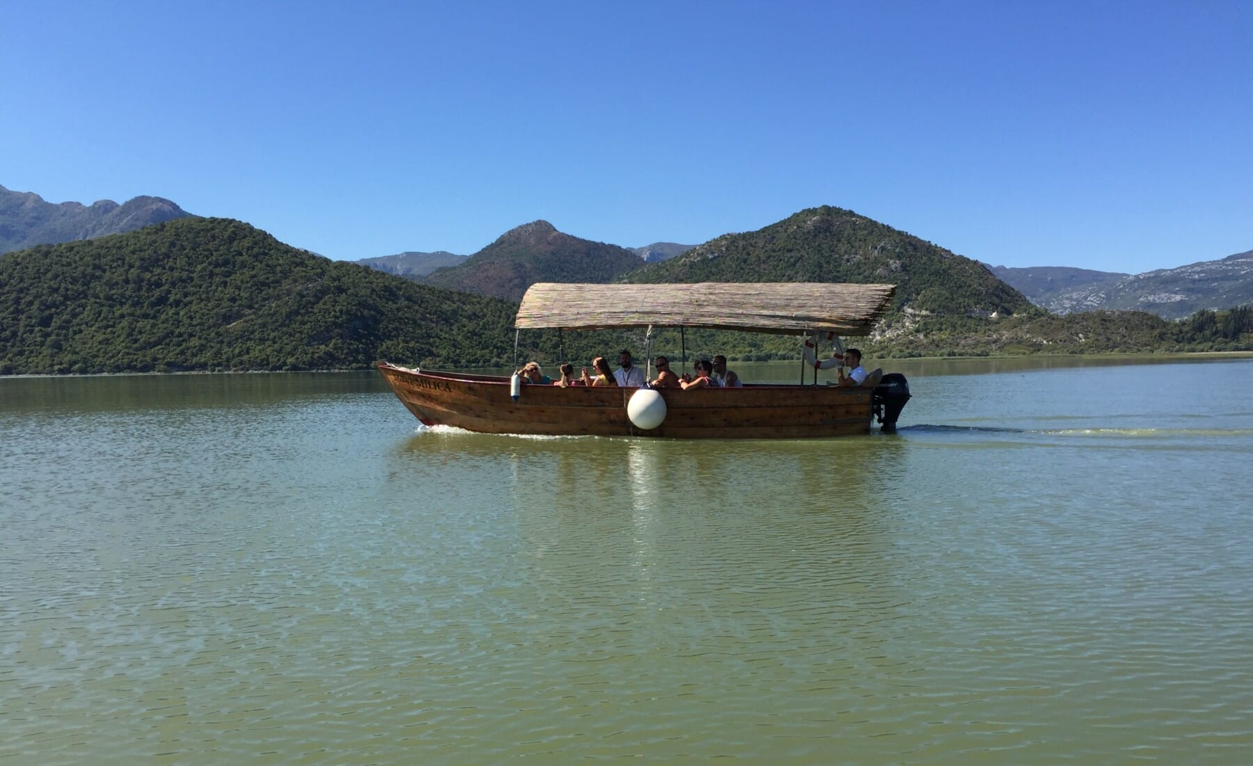 Boat with tourists on the Skadar Lake, Montenegro