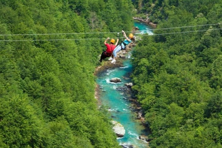 couple-taking-selfie-tara-river-background-zipline-montenegro-adventure Couple taking selfie, Tara river