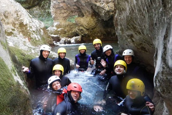 The group in the river taking a photo, Canyon Nevidio