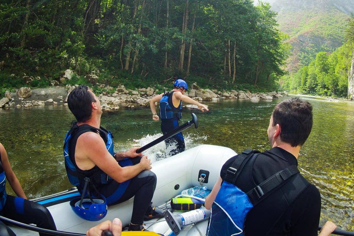 People enjoy rafting Tara, Montenegro