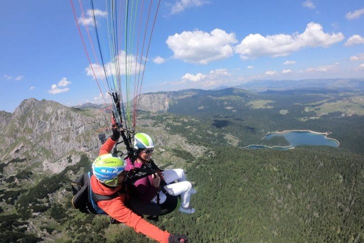 11Flying over beautiful Black Lake mountains tandem paragliding Savin Kuk with Montenegro Adventure