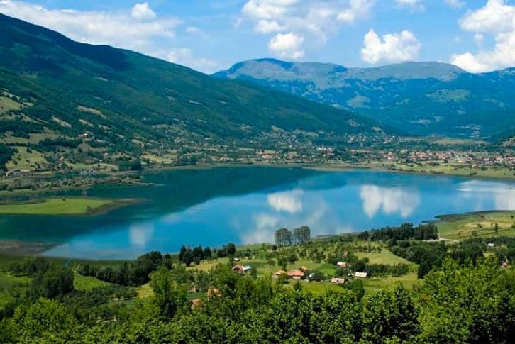 Gorgeous view on Plav Lake and mountains around