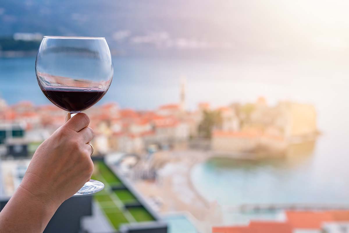 Drinking red wine in Budva