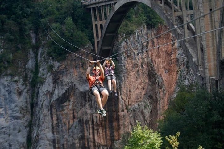 father-son-enjoying-zipline-montenegro-adventure Father and son enjoying Zipline, Tara Bridge