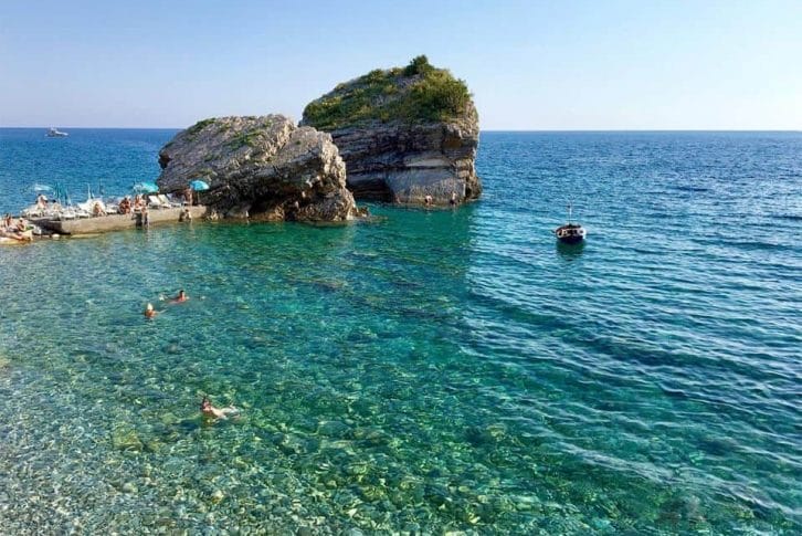 Travellers enjoying the sun and beach in Budva