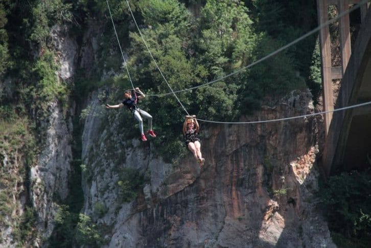 Couple having fun zipline, Tara river