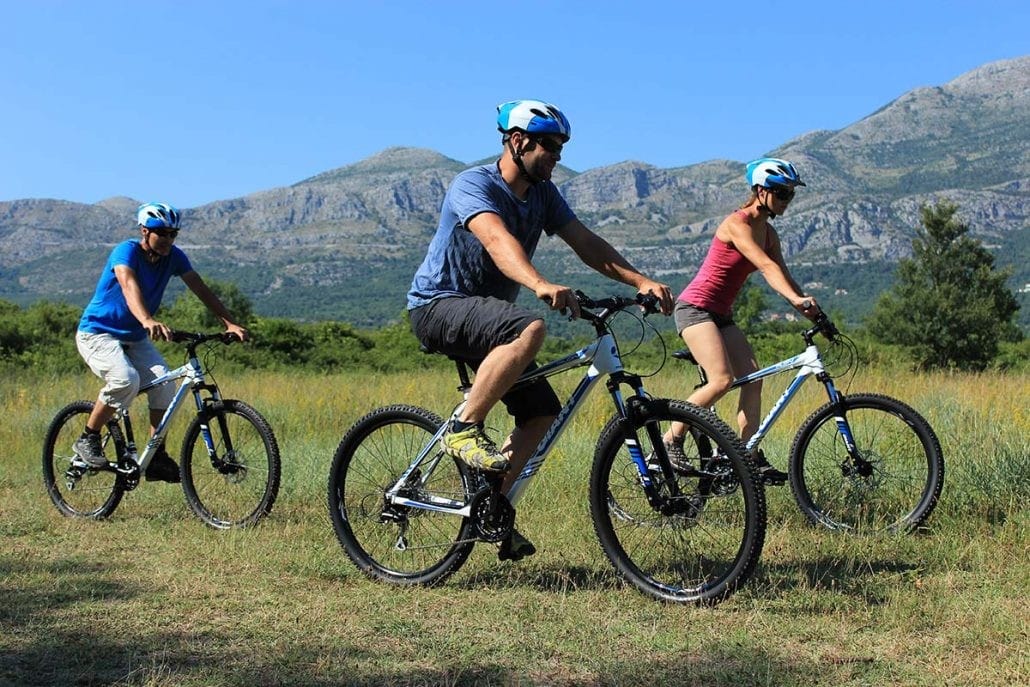 A biking through meadows in Konavle valley adventure tour