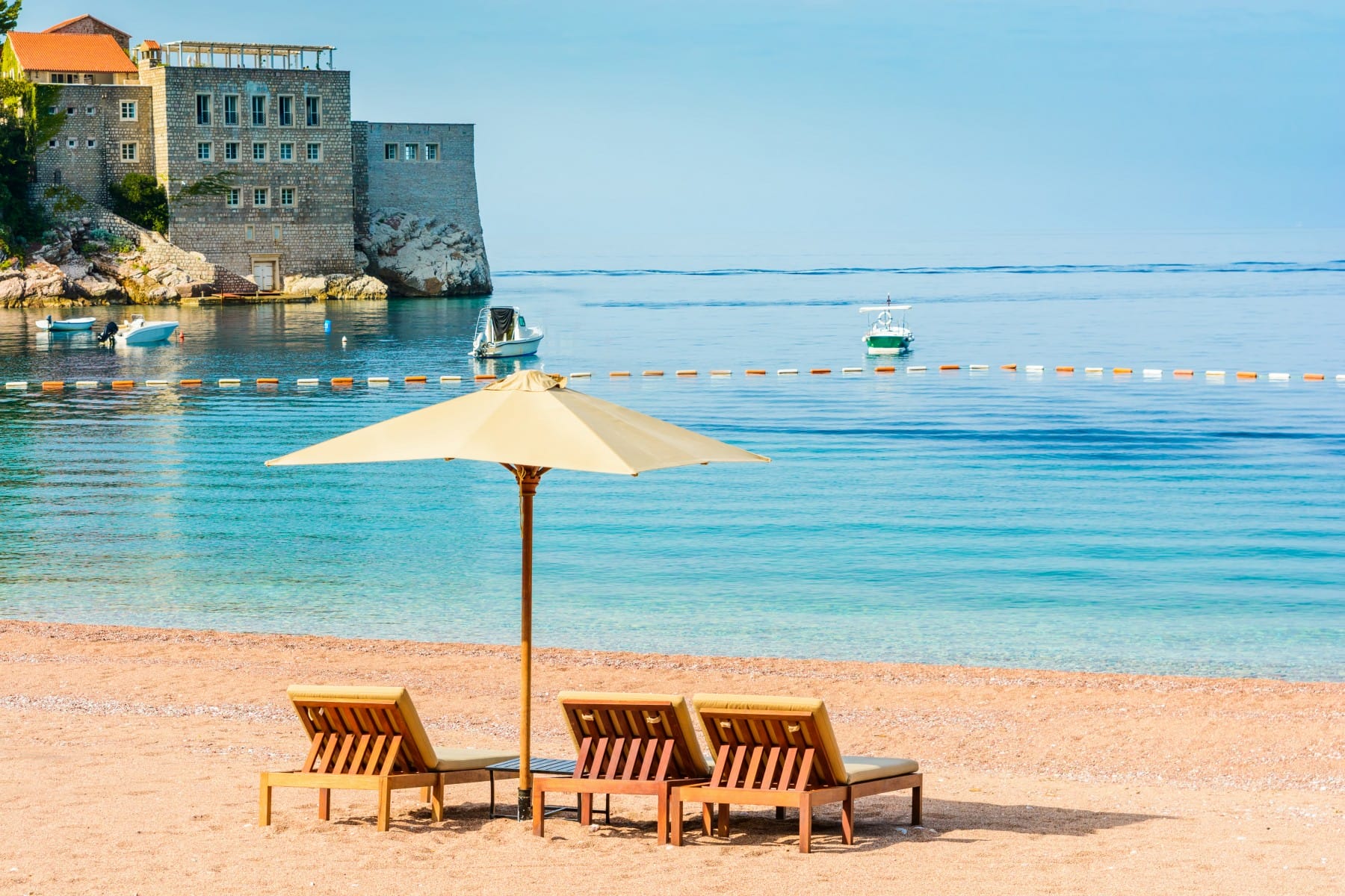 Desk chairs on sandy beach on the Budva Riviera Montenegro