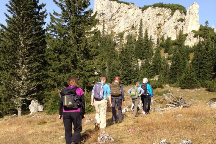 hiking-durmitor-crvena-stijena-on-path-through-meadow