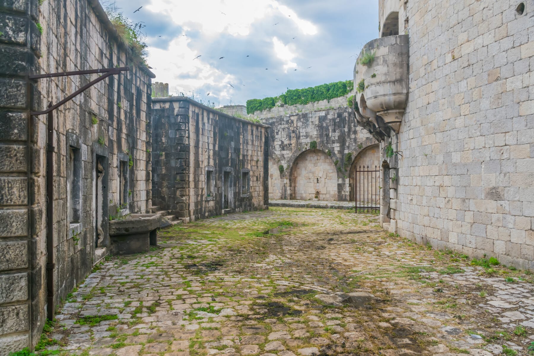The courtyard is in the military fortress of Mamula. Montenegro, Boka-Kotor Bay.