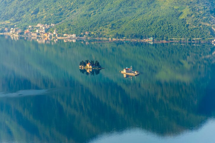 Gospa-od-Shkrpjela from a bird's-eye view of the Boko-Kotor Bay.