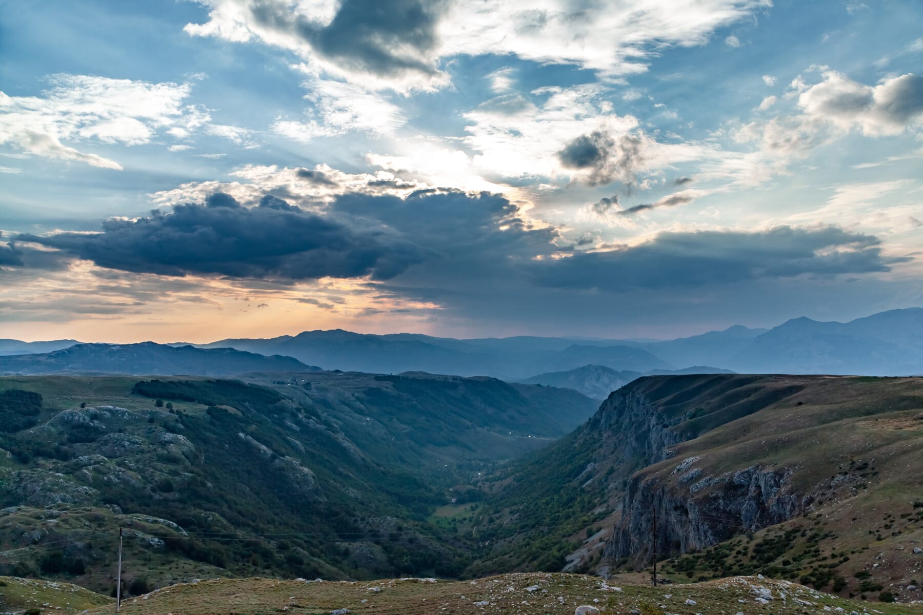 panoramic view of green valley with stones in Durmitor massif, Montenegro