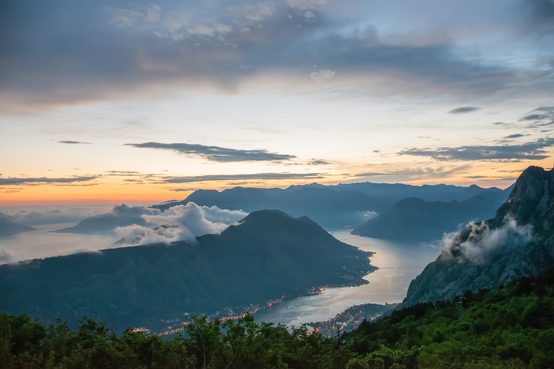 View of Kotor Bay from a high mountain peak at sunset.