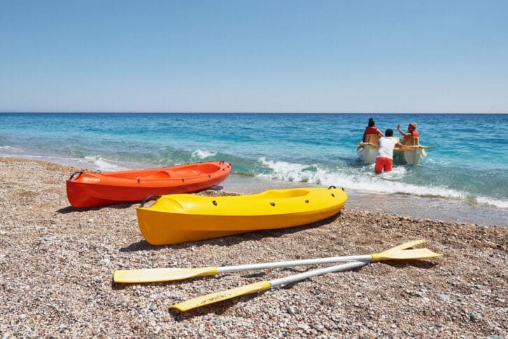 Colorful kayaks on the beach. Beautiful landscape