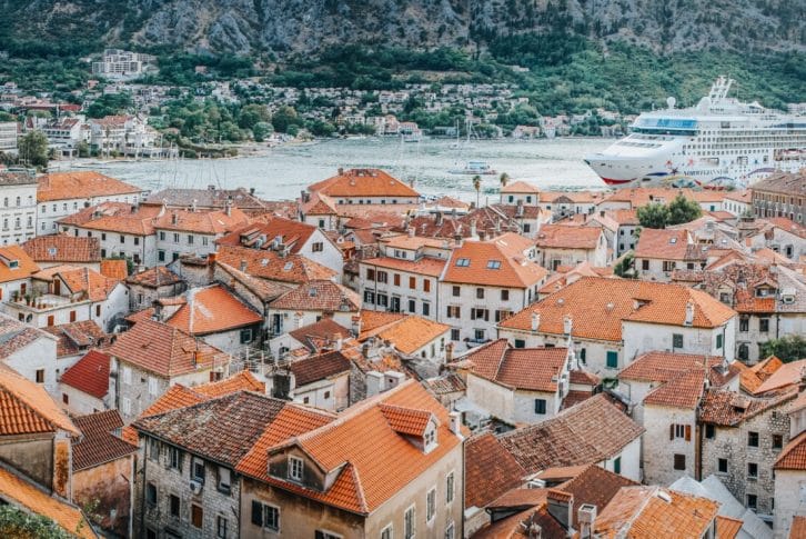 Cityscape of Kotor old town and cruseirship anchored in the Bay of Kotor in Montenegro