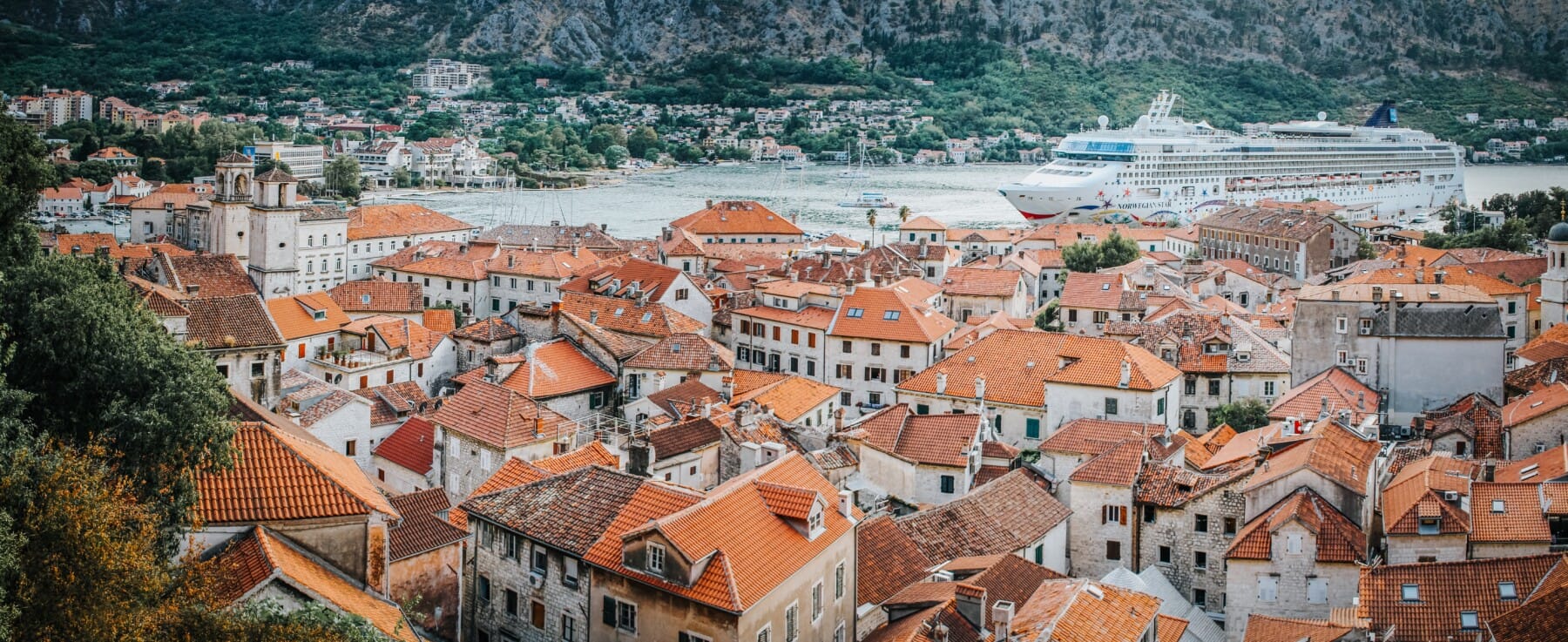 Cityscape of Kotor old town and cruseirship anchored in the Bay of Kotor in Montenegro