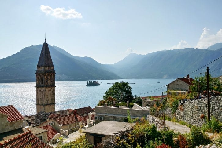 Bell tower of the church of Saint Nicholas in Perast with the view of the two picturesque islands Montenegro