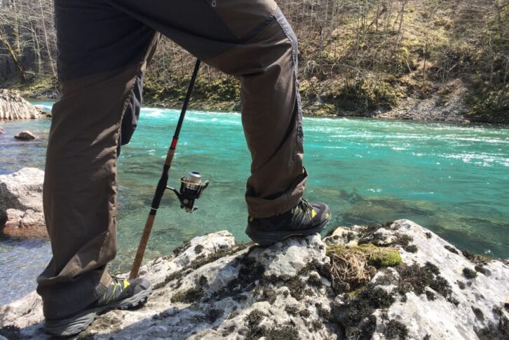 Fisher at stone fishing