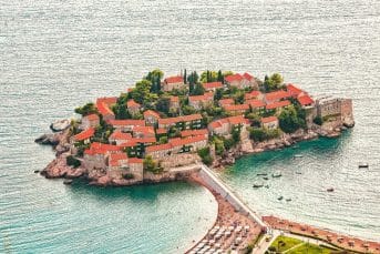 Aerial stunning view of the islet Sveti Stefan from church st. Sava viewpoint