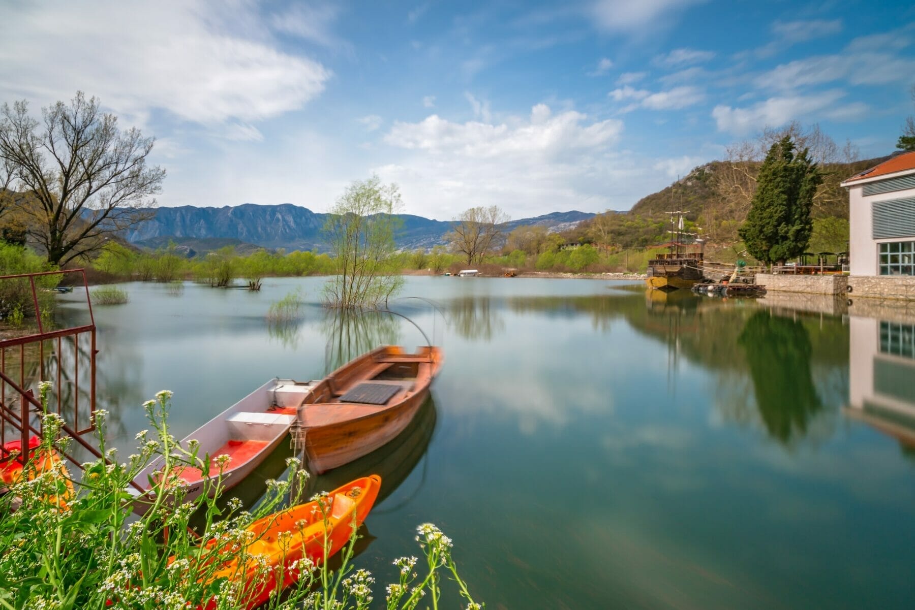 Fisherman boats on the shore of lake Skadar