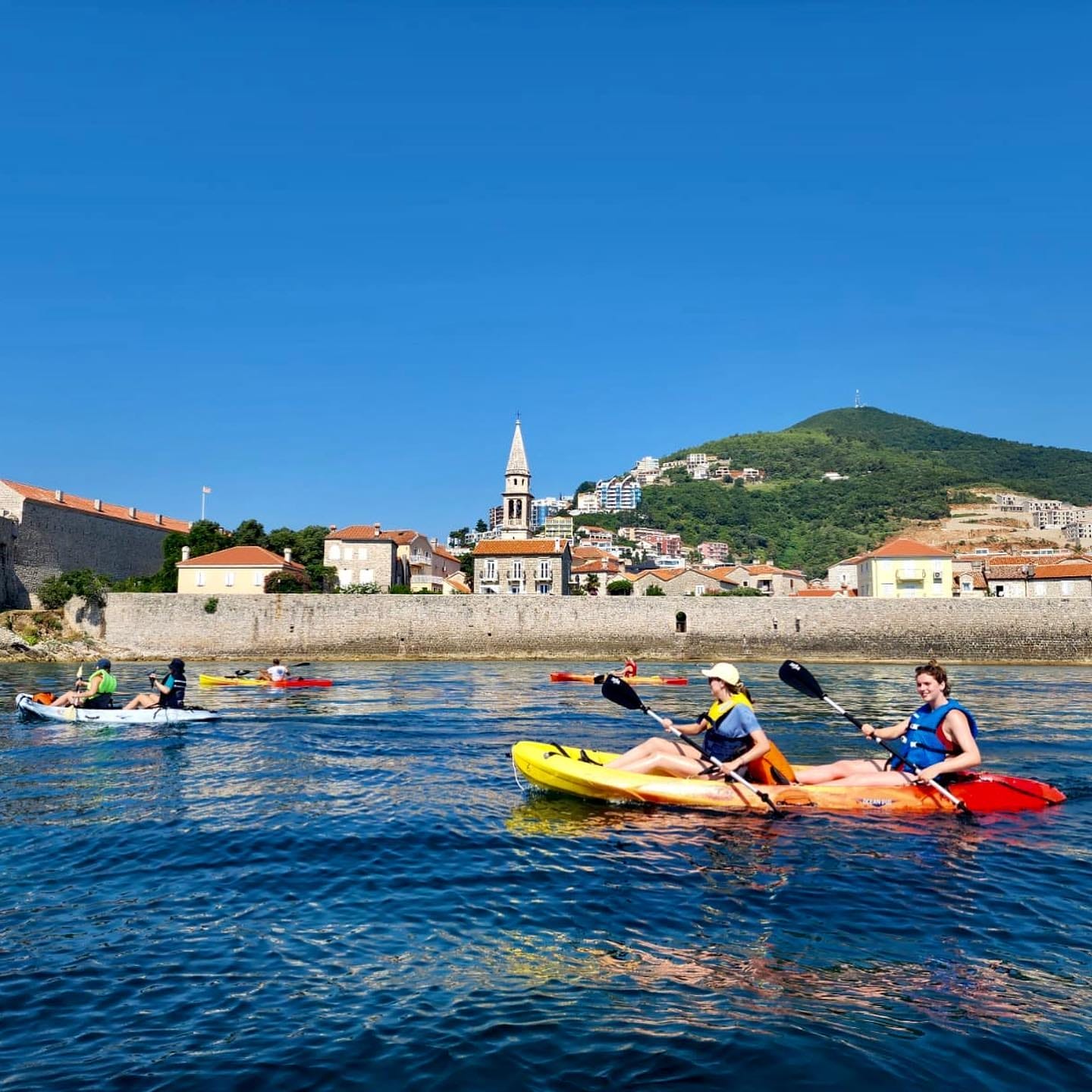 Kayak or SUP Budva on Adriatic sea by Old Town walls